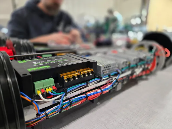 subsea pressure sensor module being wired by wassoc technician