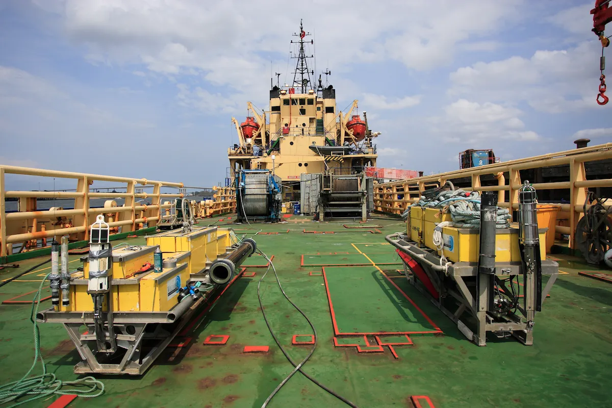 Survey vessel deck with two side-scan sonars sitting side by side