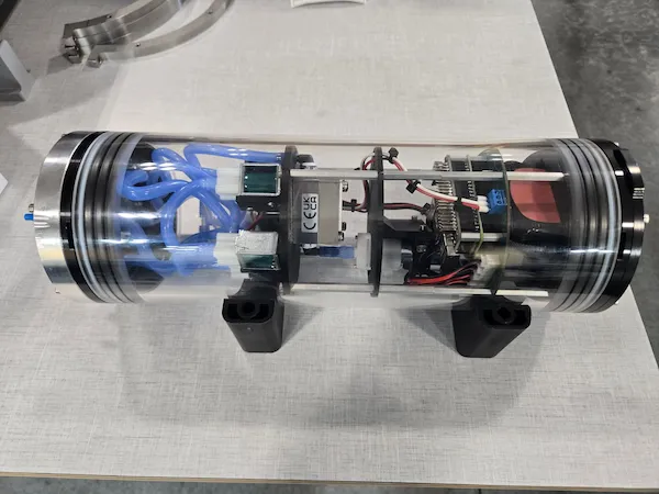 Prototype Animal-borne mini camera with purple led lights on