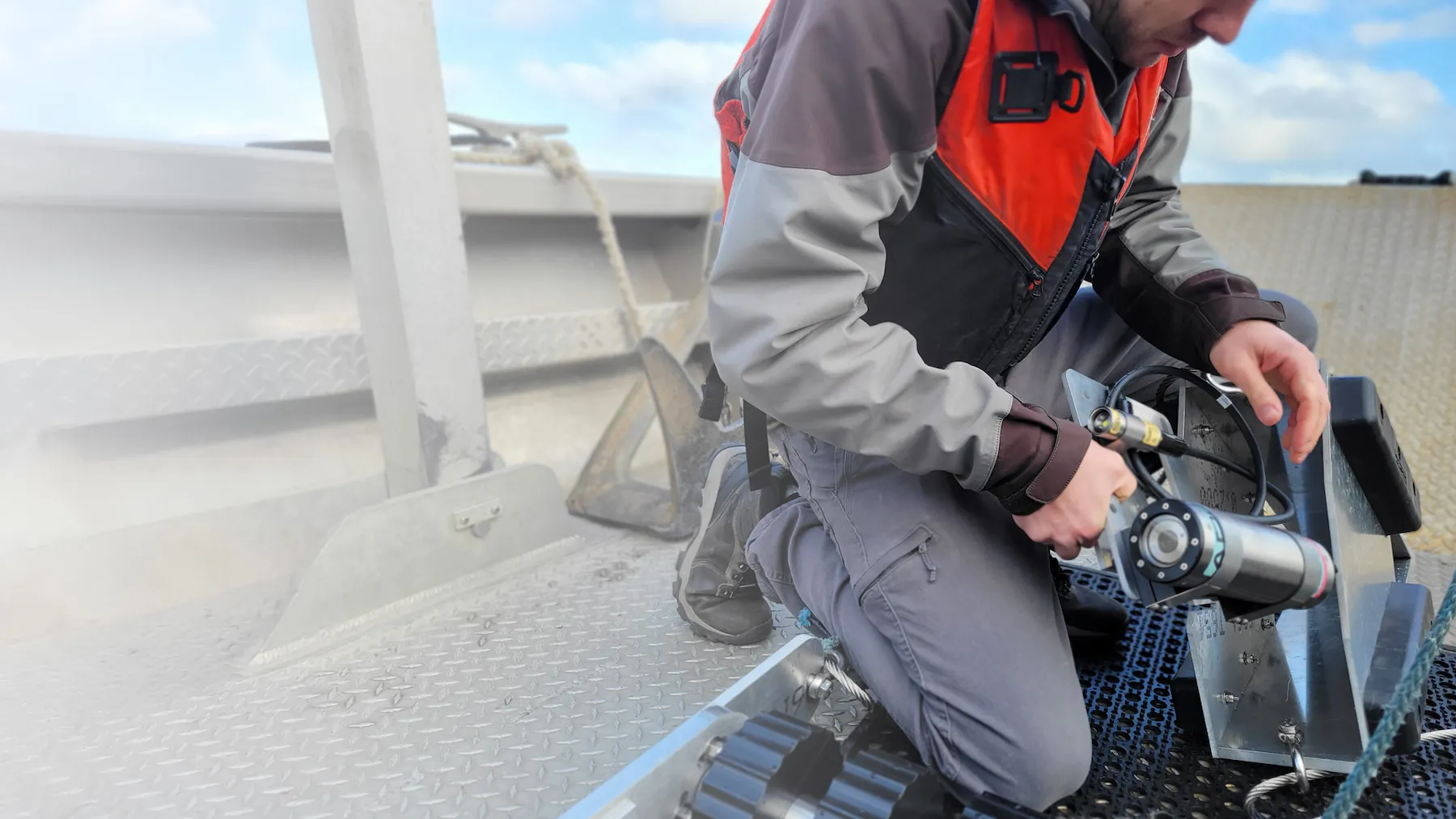 wassoc engineer inspecting arc and sll assembly for deployment